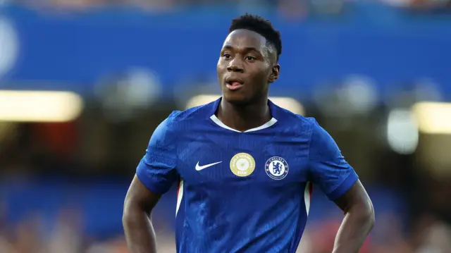 Dario Essugo looks on for Chelsea
