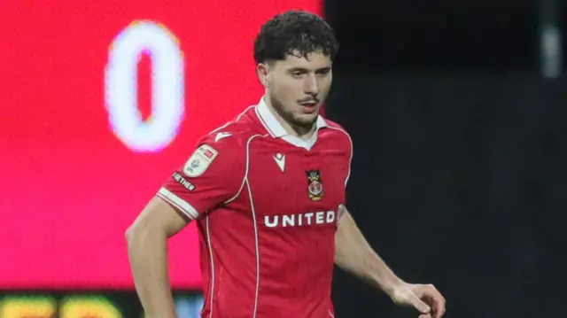 Wrexham's left wing-back Liberato Cacace