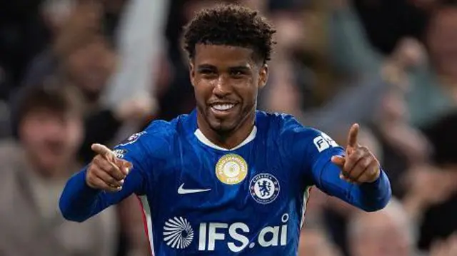 Andrey Santos points after scoring for Chelsea