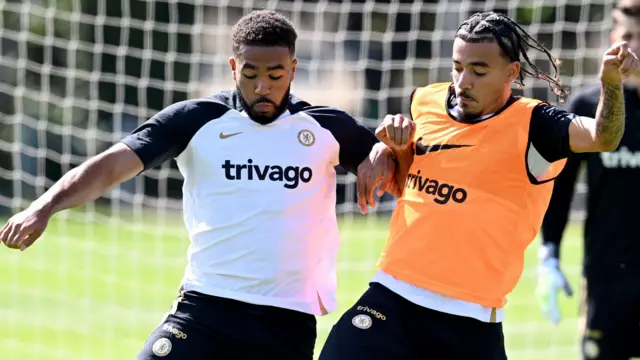 Reece James and Malo Gusto compete against each other in training