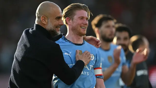Kevin de Bruyne and Pep Guardiola