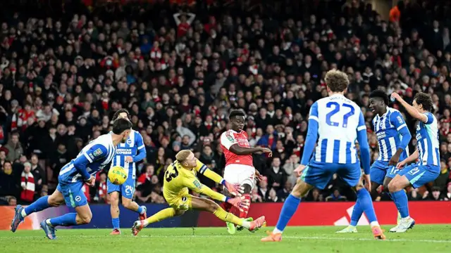 Bukayo Saka scores his team's second goal as Jason Steele fails to make a save