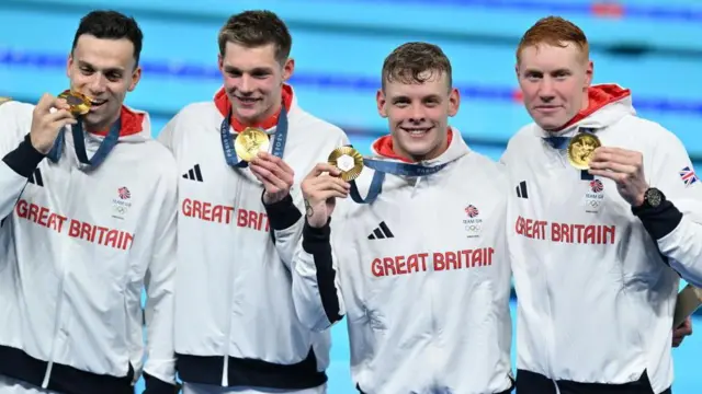 James Guy, Duncan Scott, Matt Richards and Tom Dean win their gold medals