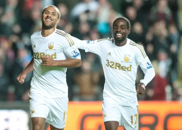 Wayne Routledge and Nathan Dyer celebrate a Swansea goal