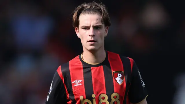 Alex Scott looks on for Bournemouth