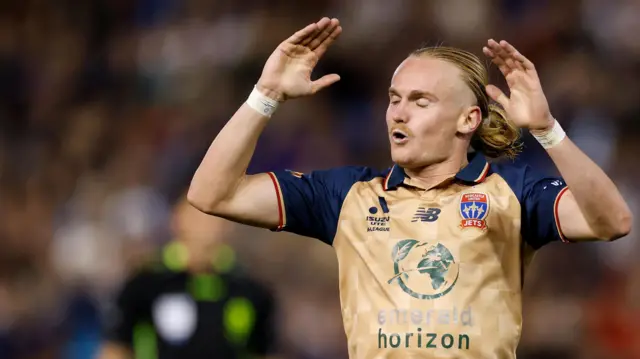 Lachlan Rose grimaces with Newcastle United Jets