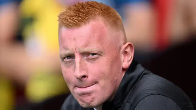 Will Still looking pensive as he watches Southampton's game against Wrexham