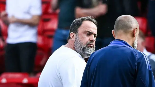 Marinakis engaged in a heated conversation with Nuno