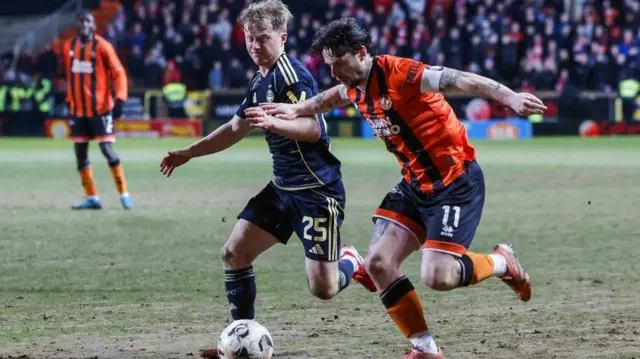 Aberdeen's Lyall Cameron and Dundee United's Will Ferry