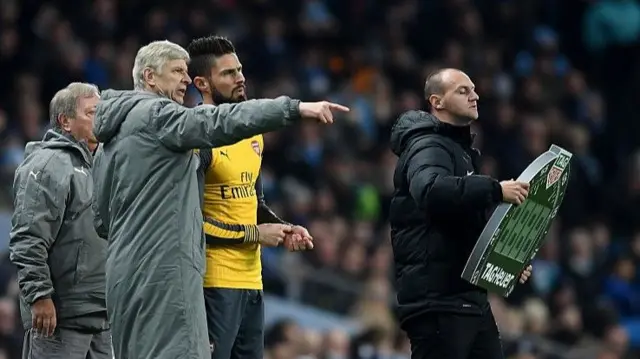 Arsene Wenger and Olivier Giroud