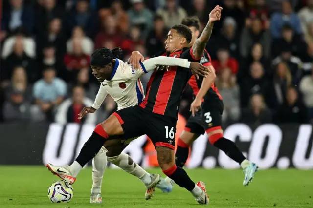 Chelsea's Noni Madueke and Bournemouth's Marcus Tavernier compete for the ball