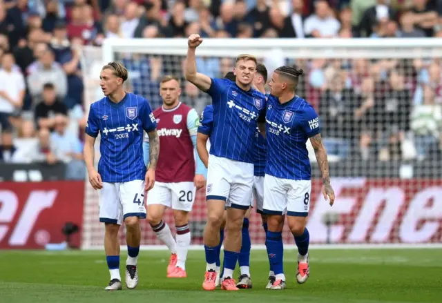 Ipswich Town players celebrate following Liam Delap's goal against West Ham United