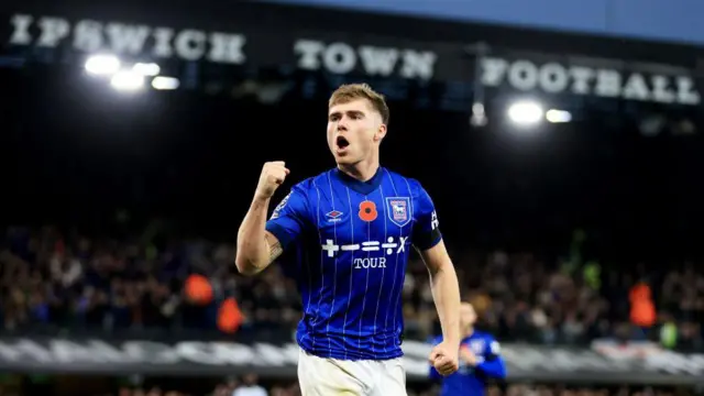 Leif Davis of Ipswich Town celebrates scoring his team's first goal during the Premier League match between Ipswich Town FC and Leicester City FC at Portman Road