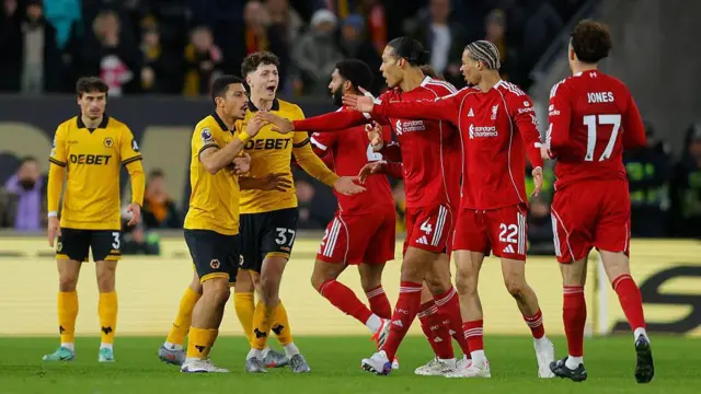 Wolves and Liverpool players argue during the league game between the two sides on Tuesday
