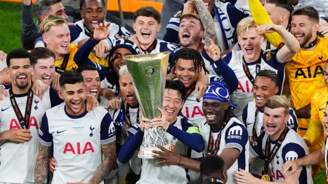 Son Heung-min holds the Europa League trophy