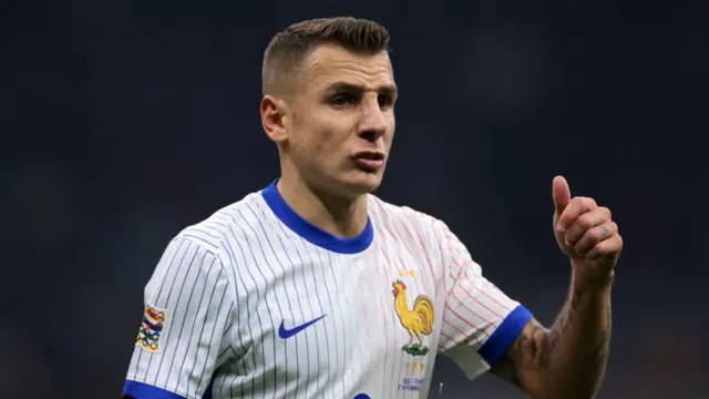 Lucas Digne of France reacts during the UEFA Nations League 2024/25 League A Group A2 match between Italy and France at Stadio Giuseppe Meazza on November 17, 2024