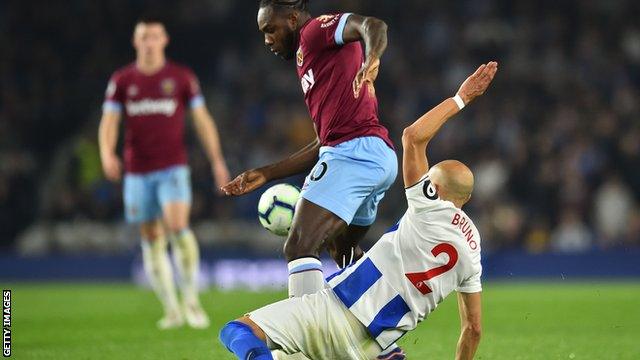 Bruno tackling Michail Antonio