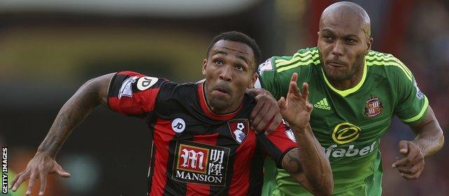 Bournemouth striker Callum Wilson evades Sunderland defender Younes Kaboul