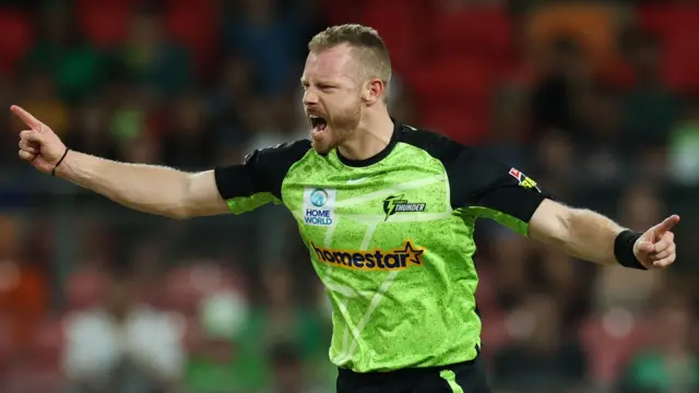 Nathan McAndrew of Sydney Thunder celebrates a wicket