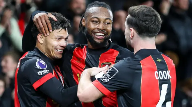 Antoine Semenyo of Bournemouth celebrates after scoring to make it 3-0 with team-mates Evanilson and Lewis Cook