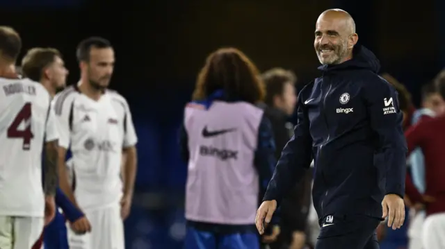 Enzo Maresca smiles at full-time of a Chelsea victory