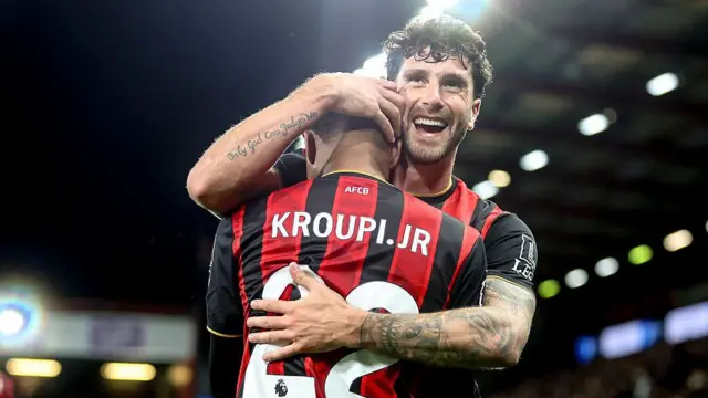 Eli Junior Kroupi of Bournemouth celebrates with Marco Senesi.