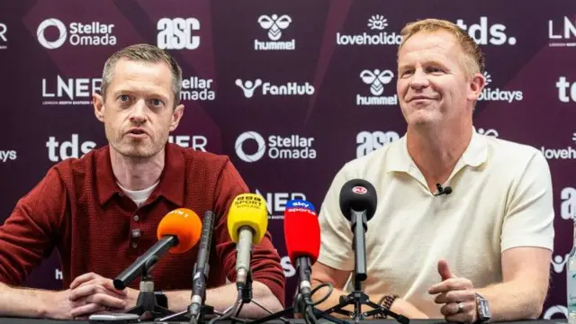 Wouter Vrancken (R) is unveiled by Sporting Director Graeme Jones (L) as the new Head Coach of Heart of Midlothian Football Club during a press conference at Tynecastle Park, on June 25, in Edinburgh, Scotland