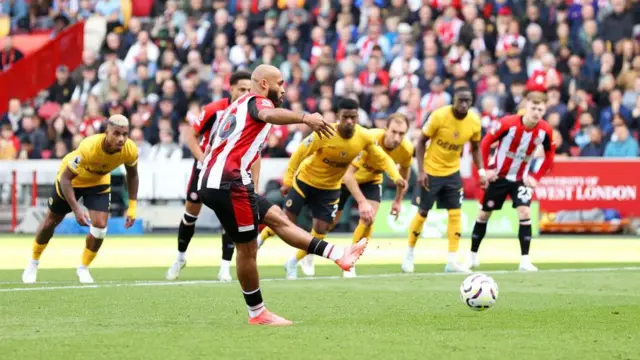 Bryan Mbeumo scores from the penalty spot in Brentford's Premier League win over Wolverhampton Wanderers