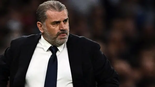 Ange Postecoglou stands on the touchline