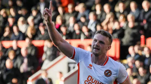 Dundee United's Sam Dalby celebrates after scoring to make it 2-0 during a William Hill Premiership match between Aberdeen and Dundee United at Pittodrie Stadium, on March 02, 2025