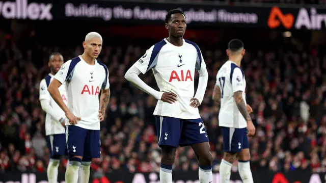 Tottenham players looking disappointed 