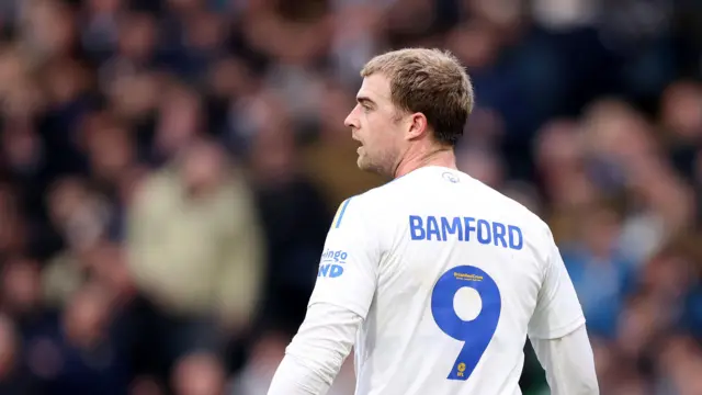 Image showing back of Patrick Bamford shirt with number nine on it while he looks on sideways
