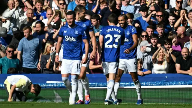 Everton striker Dominic Calvert-Lewin celebrates with team-mates