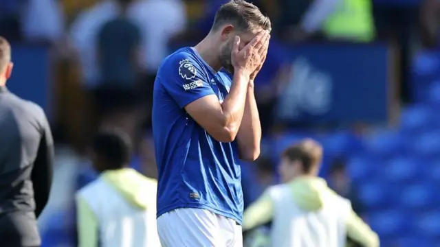 Everton defender James Tarkowski looks dismayed