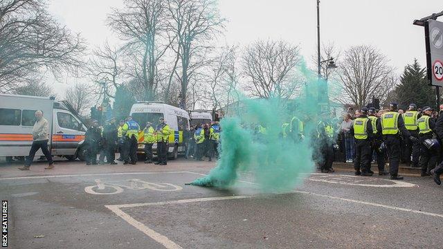 A smoke bomb was let off outside the ground before the FA Cup tie between Tottenham and Millwall