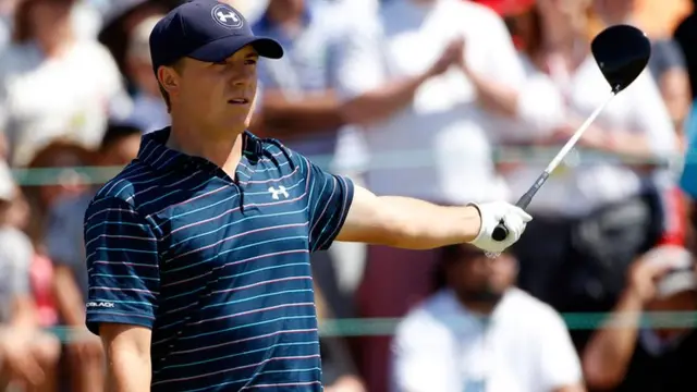 Jordan Spieth reacts to his tee shot