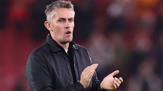 Ipswich boss Kieran McKenna applauds supporters after their loss at Middlesbrough