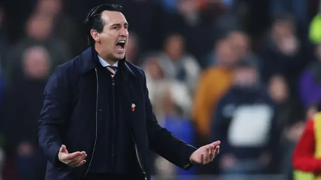 Unai Emery looks on from the touchline