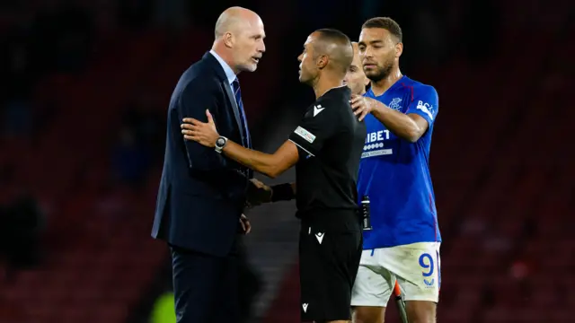 Philippe Clement speaks with referee Marco Guida at full-time