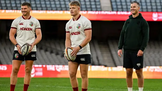 Owen Farrell and Fin Smith with Johnny Sexton