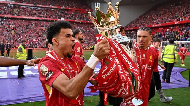 Luis Diaz with the Premier League trophy