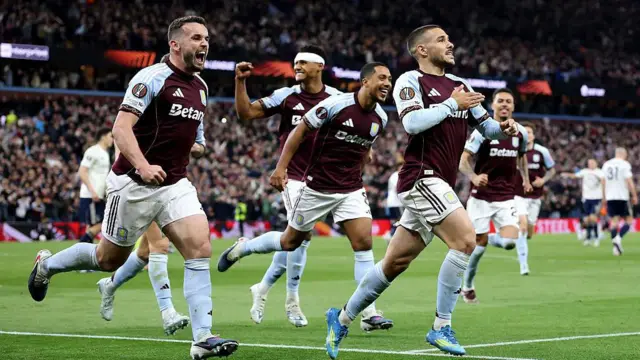 Aston Villa players celebrate