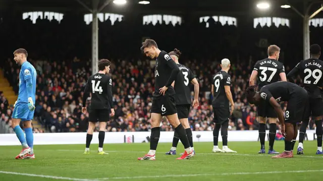 Tottenham players look dejected
