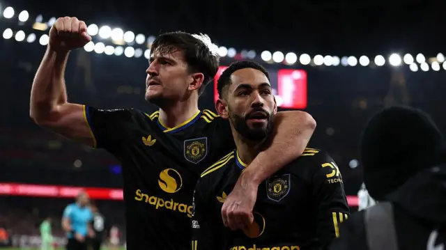 Matheus Cunha celebrates