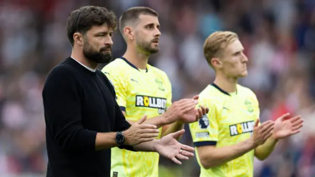 Southampton Manager Russell Martin applauds the fans