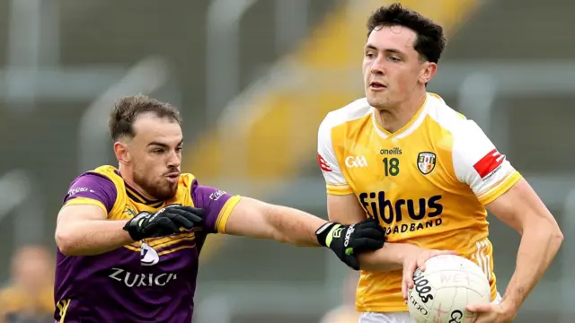 Antrim's Conor Stewart and Dylan Furlong of Wexford
