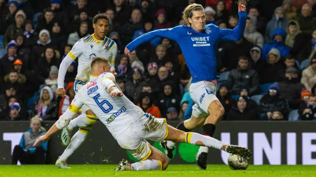 Rangers' Todd Cantwell is tackled by St Johnstone's Liam Gordon 