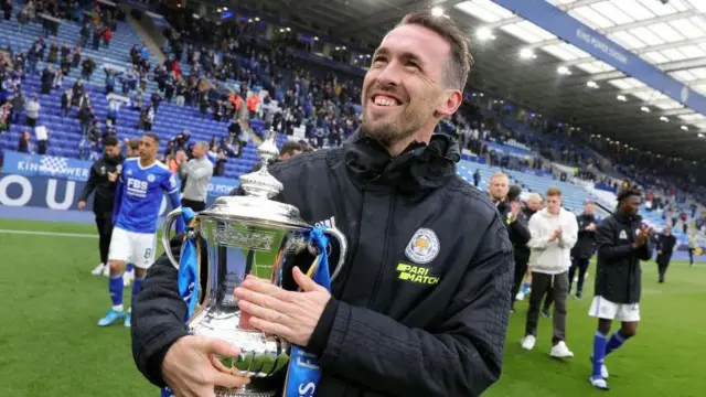 Christian Fuchs celebrates with the FA Cup while playing for Leicester