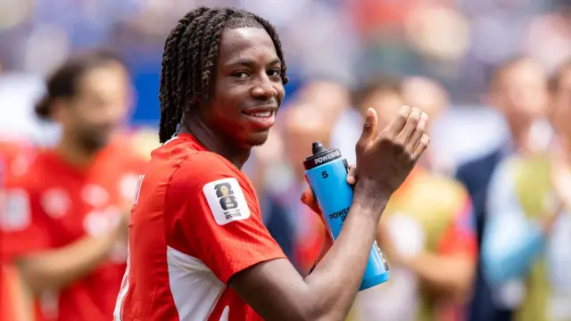 Johan Manzambi of Switzerland applauds the crowd after the FIFA World Cup 2026 Group B match between Switzerland and Bosnia and Herzegovina at Los Angeles Stadium on June 18, 2026