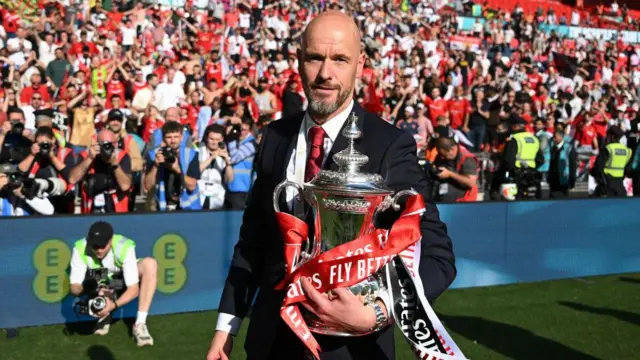 Erik ten Hag holds the FA Cup